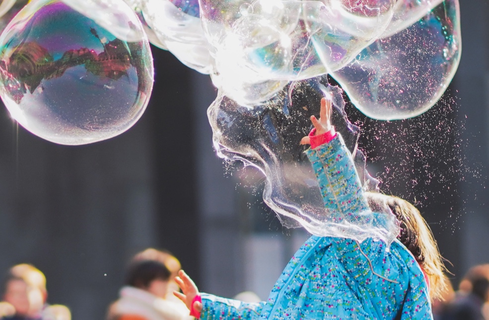 Children plaing with the bubbles